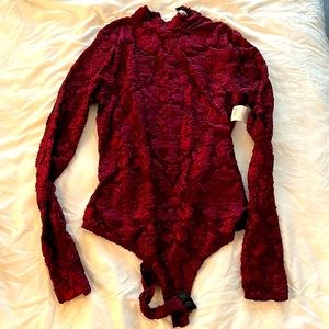 Akira burgundy bodysuit